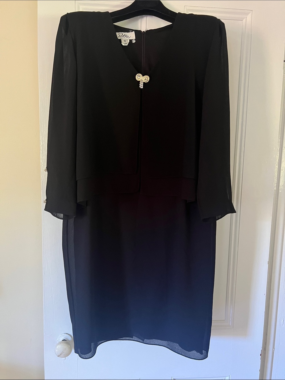 Patra Black Crepe Layered cocktail dress. All attached..easy on. Shoulder pads.